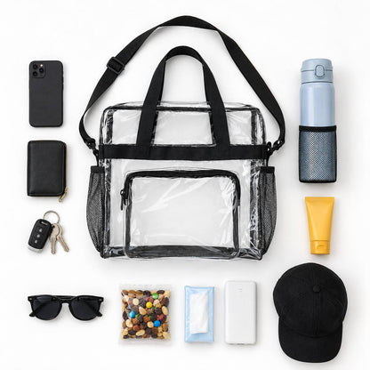Clear tote bag surrounded by phone, wallet, keys, sunglasses, water bottle, cap, and snacks