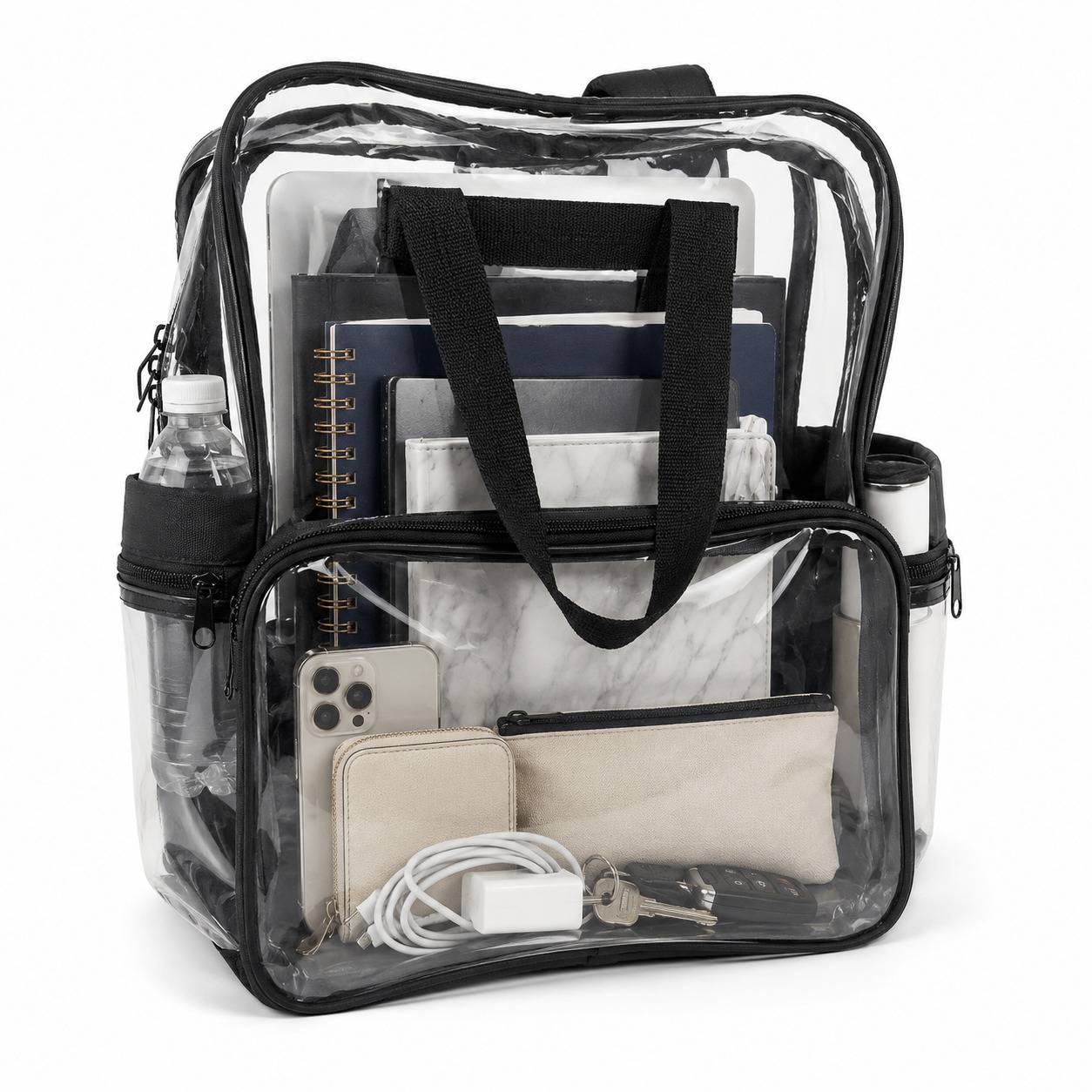Clear backpack with cloth bottom filled with a marble notebook, zip pouch, charging cable, and wallet visible through the clear panels.