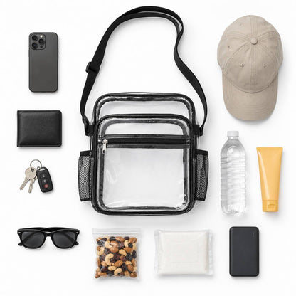 Clear crossbody bag surrounded by phone, wallet, keys, sunglasses, water bottle, cap, and snacks
