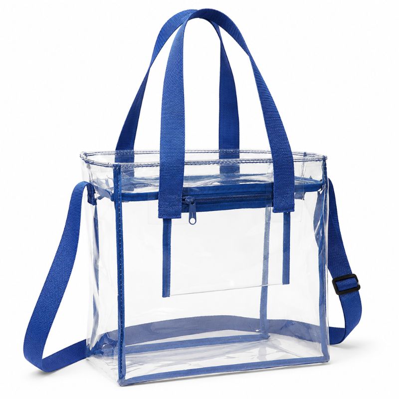 Clear crossbody stadium tote with navy trim, dual handles, top zipper and adjustable shoulder strap.