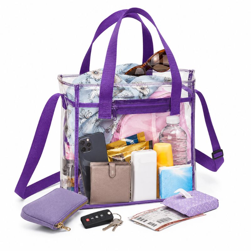 Purple-trim clear crossbody tote packed with a water bottle, phone, wallet, sunglasses, pouch and other event essentials.