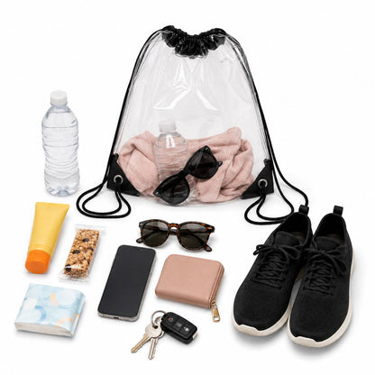 Clear drawstring backpack with a towel and water bottle inside, surrounded by sunglasses, sneakers, and sunscreen.