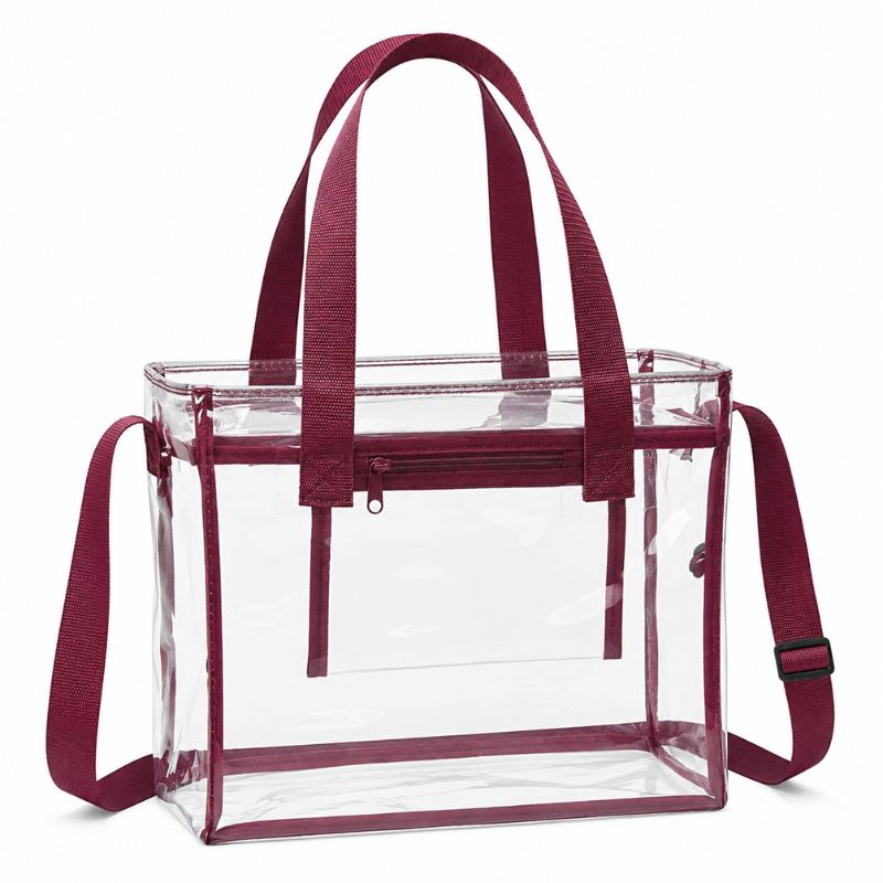 Empty clear 12 x 12 x 6 tote with burgundy trim, top handles, interior zipper pocket, and adjustable shoulder strap.