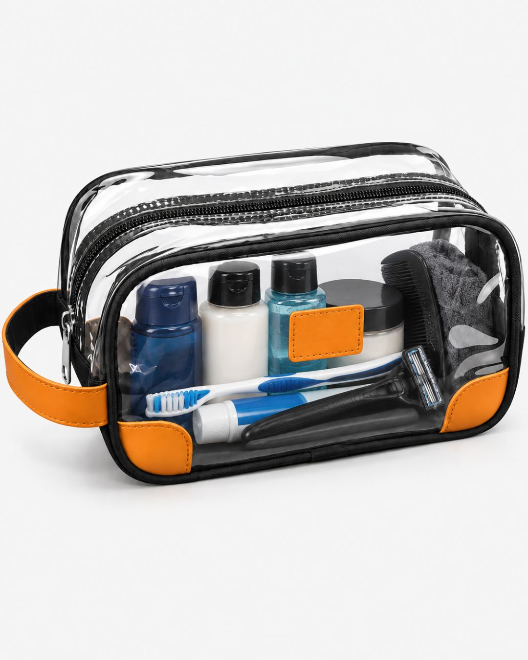 Clear travel toiletry bag packed with shampoo and lotion bottles, a razor, toothbrush, comb and a small towel for grooming on the go.