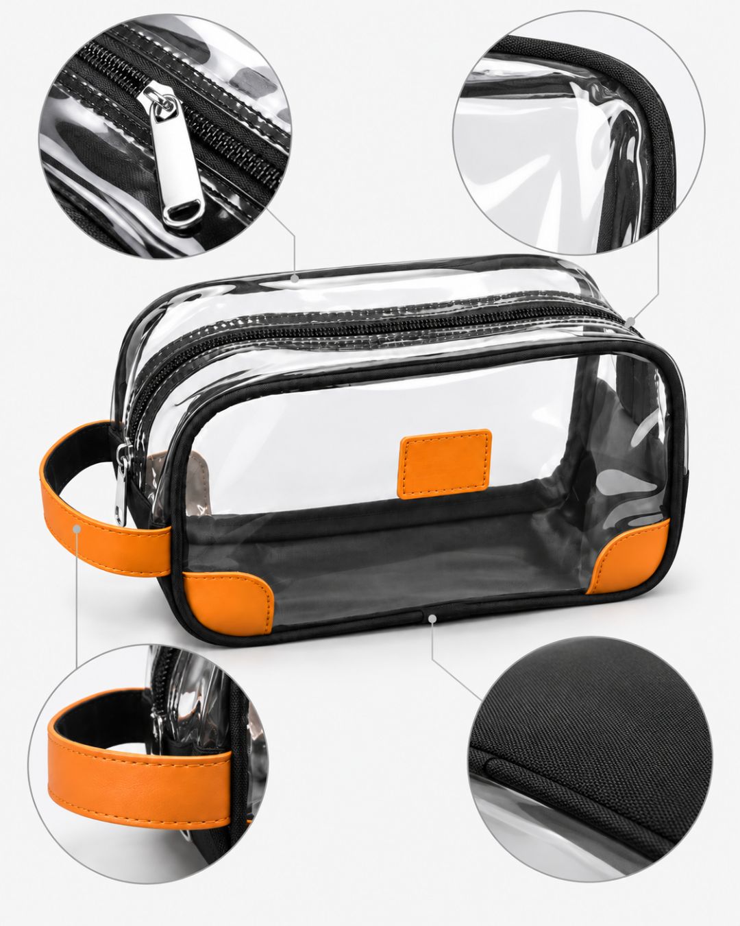 Close-up details of the clear travel toiletry bag's zipper pull, top seam, orange handle and black fabric base.