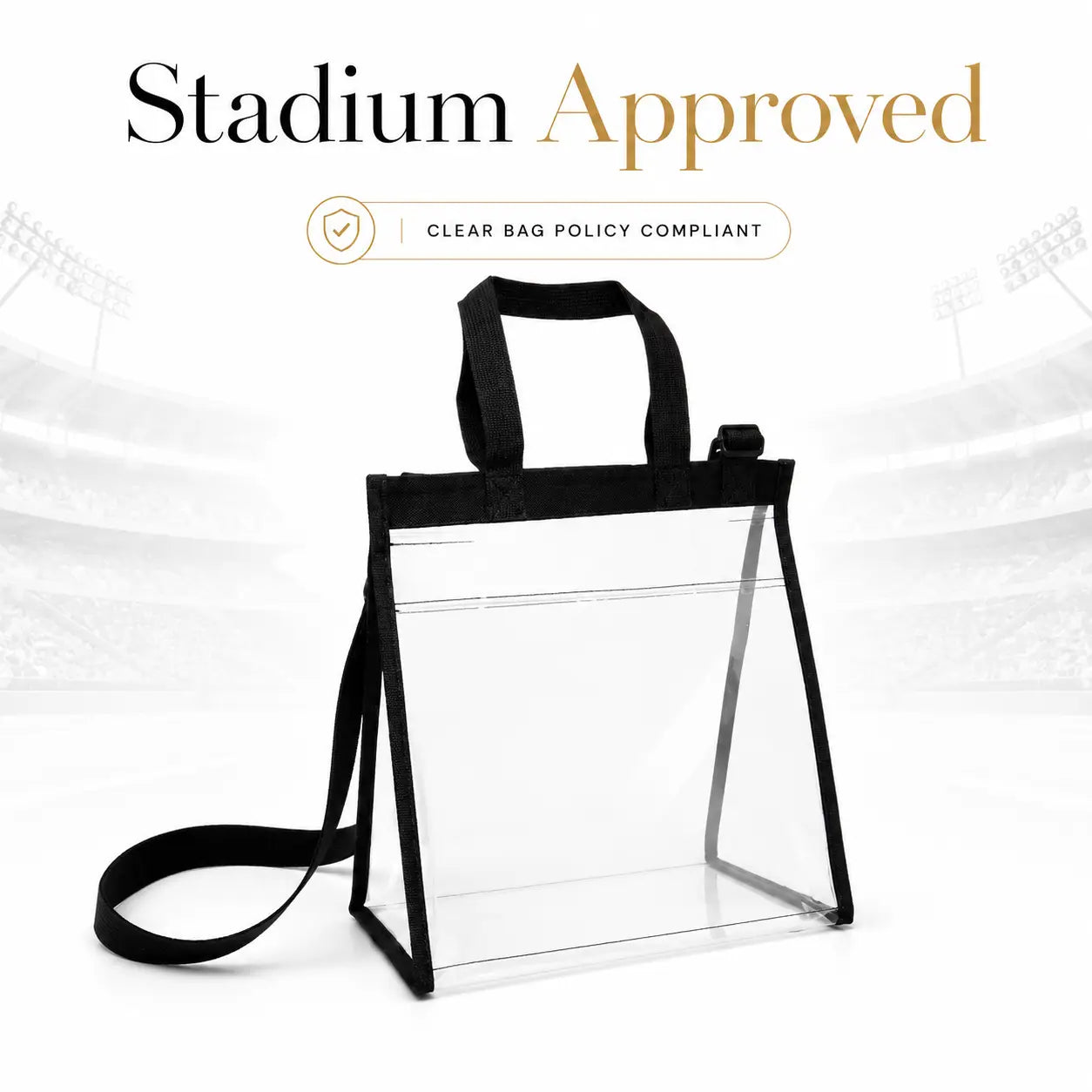 A clear stadium-approved bag with black handles and black trim, shown on a white background with a faint stadium graphic and the text 'Stadium Approved' and 'Clear Bag Policy Compliant'.