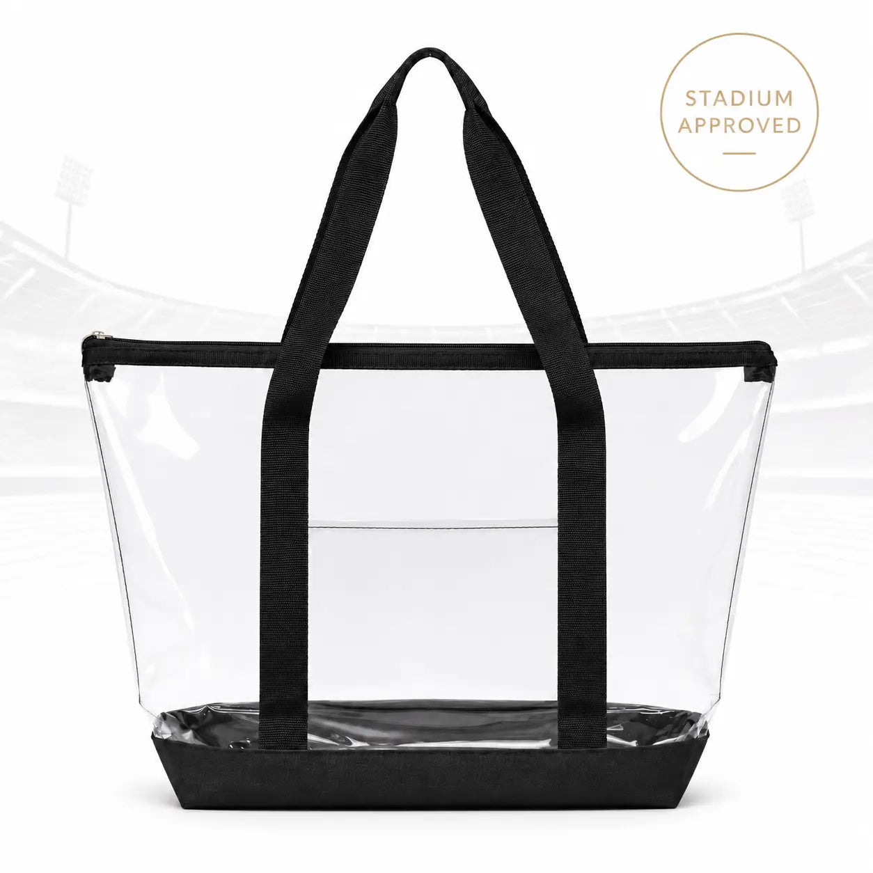 A clear plastic stadium tote bag with black handles and a black base, shown against a white background with a faint stadium graphic and a circular 'STADIUM APPROVED' badge in the top right.
